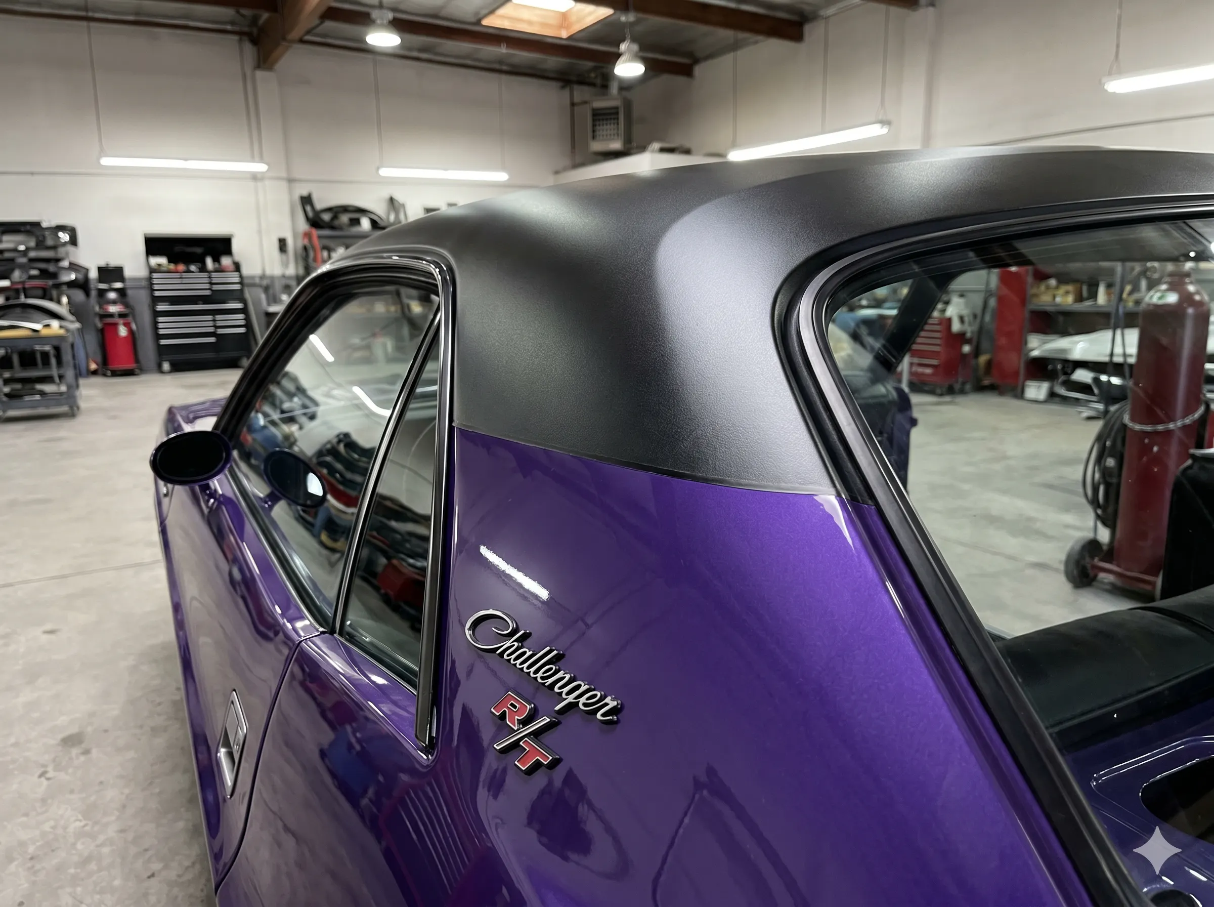 Roof and B-pillar detail — factory-correct flat-black treatment